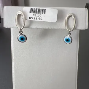 BRINCO BASE OVAL OLHO GREGO