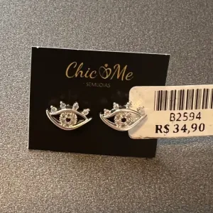 BRINCO OLHO GRAV ZIRCONIAS