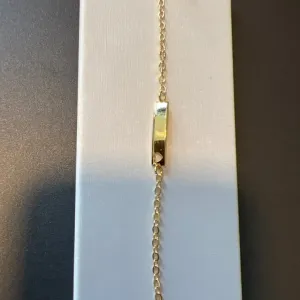 PULSEIRA PLAQUINHA CORAÇÃO