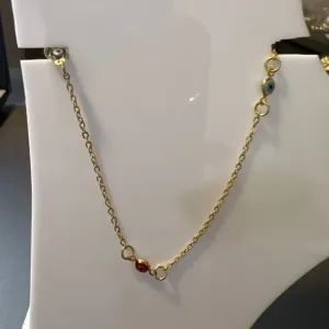 TORNOZELEIRA TRES OLHO GREGO