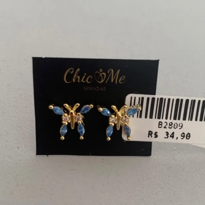 BRINCO BORBOLETA ZIRC