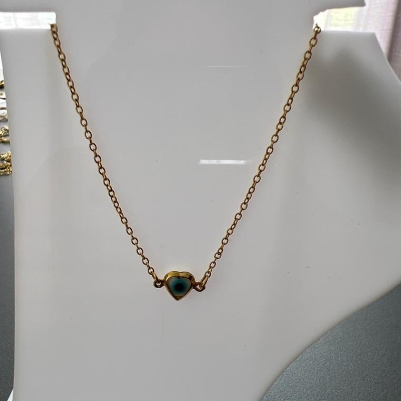 TORNOZ. OLHO GREGO CORAÇÃO