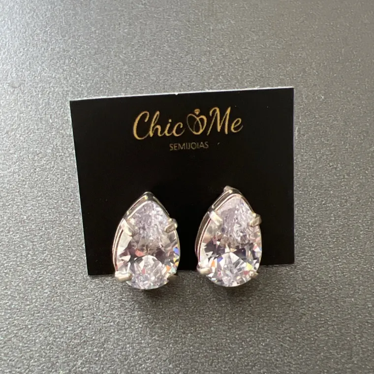 BRINCO GOTA GG ZIRC BRINCO GOTA GG ZIRC