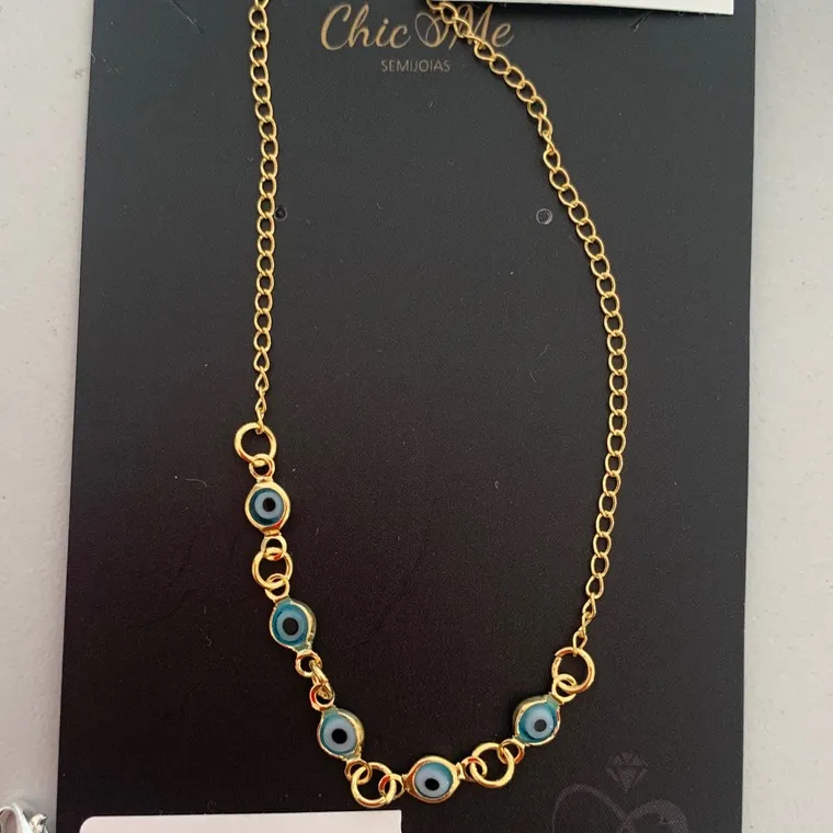 TORNOZ. CINCO OLHO GREGO