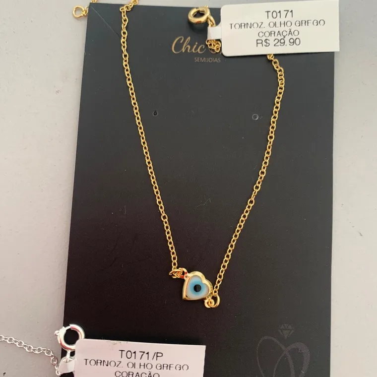 TORNOZ. OLHO GREGO CORAÇÃO