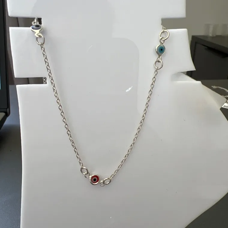 TORNOZELEIRA OLHO GREGO TORNOZELEIRA OLHO GREGO